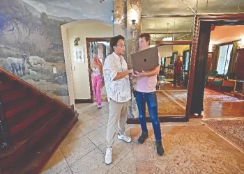 french taiwanese producer vincent wang and line producer kyle vertin talk while filming love through all seasons at the wrensmoor castle in california photo afp