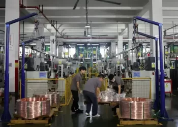 China’s factory activity shrinks again in November, services cool