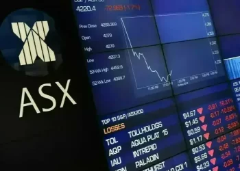 Commodity, tech stocks drag Australian shares lower; central bank’s decision awaited
