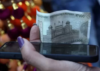 Indian rupee weakens as corporate dollar outflows eclipse Fed boost