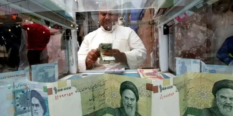 Iran’s currency sinks to a new record low