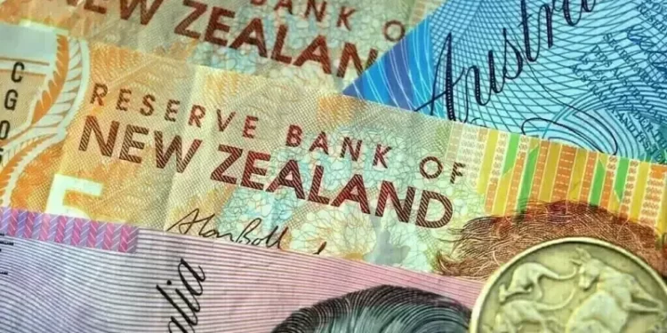 Kiwi dollar, market rates fall as RBNZ chief warns financial conditions tightening