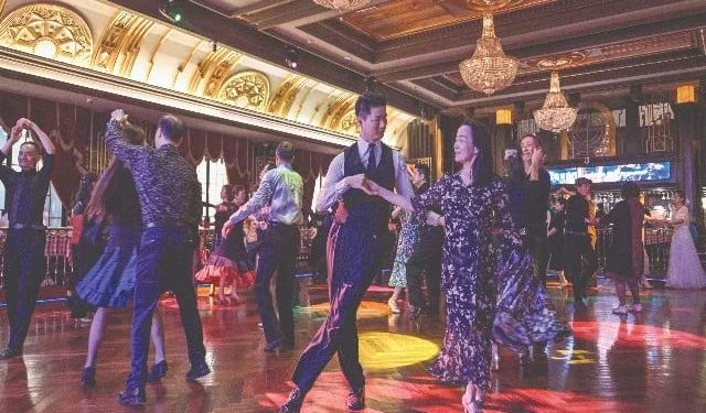 this photo taken on december 11 shows couples dancing at the paramount ballroom in the jing an district of shanghai photo afp