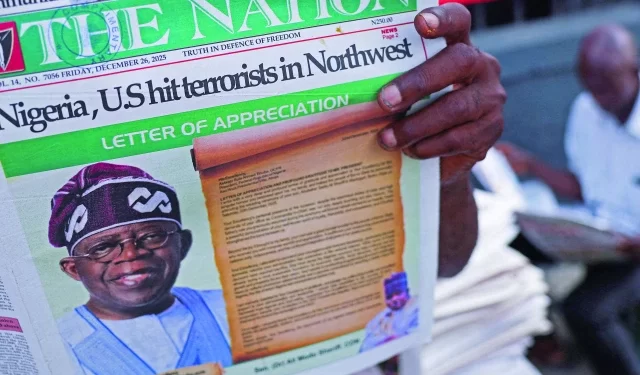 people read newspapers reporting on us airstrikes against islamic state militants in lagos nigeria photo reuters