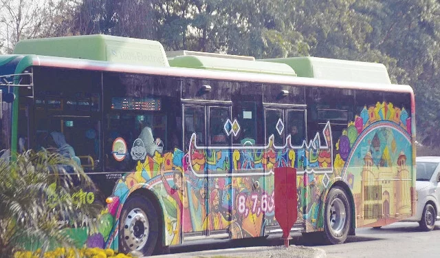 a public transport bus advertises the upcoming basant celebrations in lahore photo online