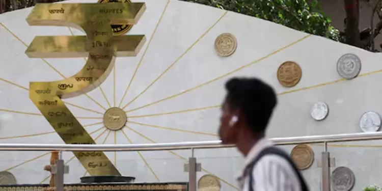 Indian rupee dragged by weak equities, hovers near record-low levels against yuan