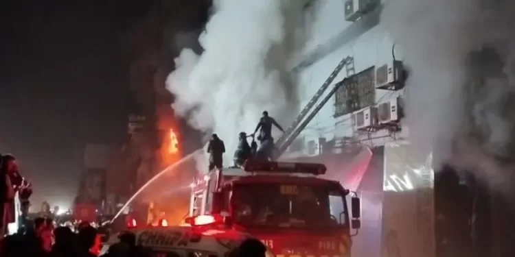 Rescue officials try to extinguish a fire at Karachi&rsquo;s Gul Plaza shopping mall on January 17. &mdash; mediaNewsTV