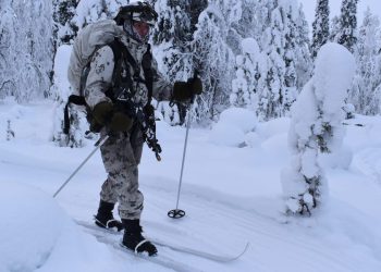 Snowmobiles, skis, and laser tag: How NATO soldiers train for Arctic assaults