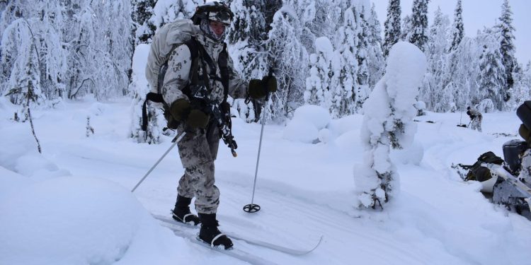 Snowmobiles, skis, and laser tag: How NATO soldiers train for Arctic assaults