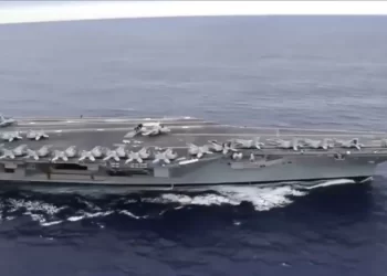 US deploys aircraft carrier as Iran warns against attack