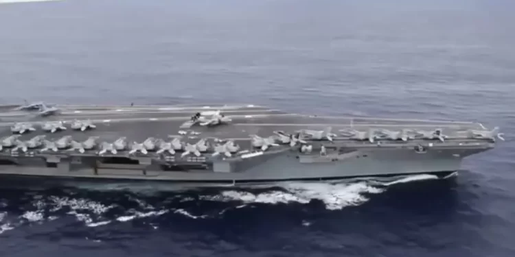 US deploys aircraft carrier as Iran warns against attack