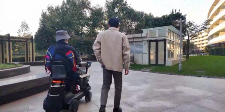 Using Only His Mind, a man with Quadriplegia Controls a Wheelchair and Sends a Robot Dog for Takeout