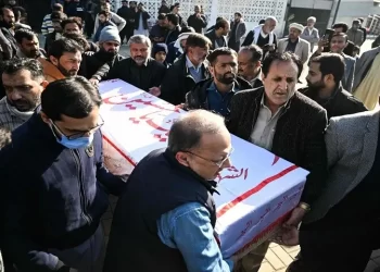 Mourners carry the coffin of a victim of the Islamabad imambargah attack on February 7, 2026. &mdash; AFP