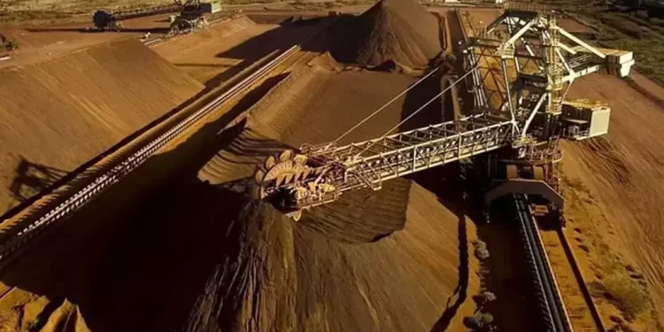 Iron ore slips on commodities rout, but supply risks limit downside