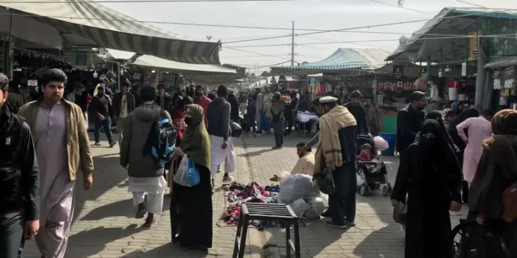 People shop at the H-9 Sunday bazaar in Islamabad on Feb 8, 2026. &mdash; Ikram Junaidi