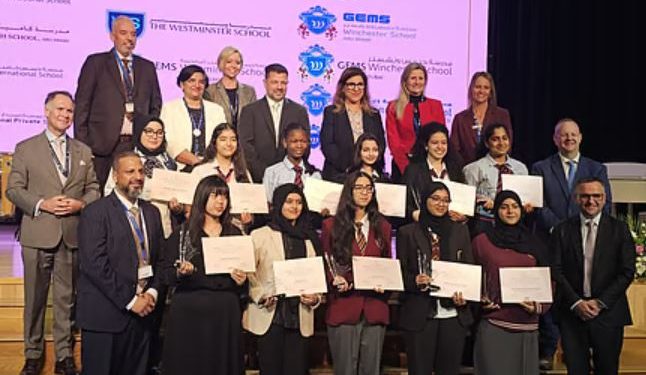The award-winning students with senior officials of GEMS