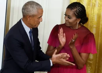 former president barack obama and former first lady michelle obama react during the unveiling of their official white house portraits in the east room of the white house in washington september 7 2022 photo reuters