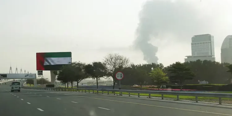 Fire near Dubai airport under control after drone attack, flights suspended