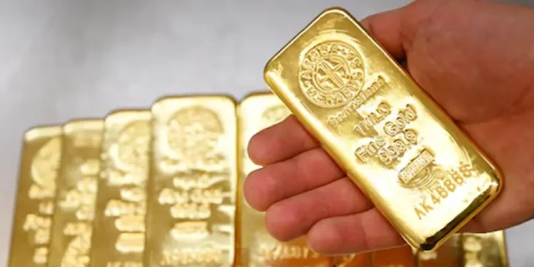 Gold set for weekly drop as oil price surge weighs on rate-cut hopes
