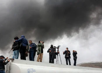 Tehran plunged into darkness by smoke from burning oil