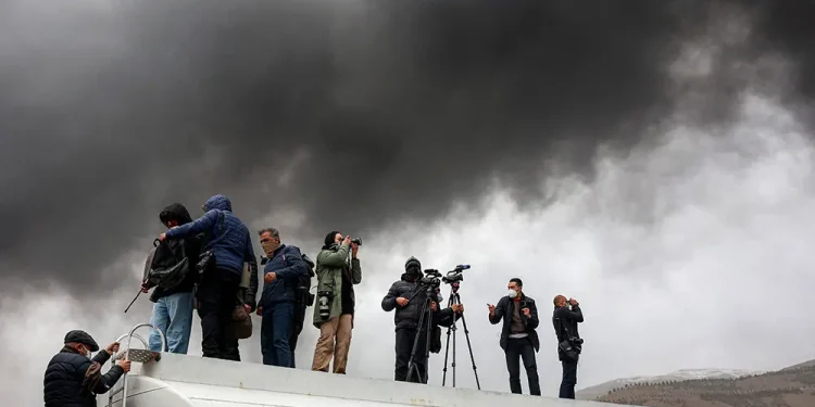 Tehran plunged into darkness by smoke from burning oil