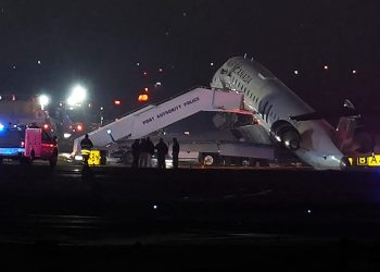 The front of an Air Canada plane was wrecked at LaGuardia after it collided with a vehicle while taxiing