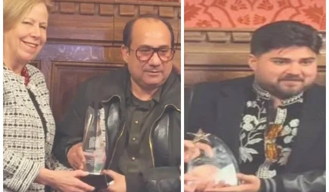 rahat fateh ali khan and his son shah zaman khan receving awards