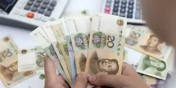 China yuan slips but looks set for third straight weekly gain