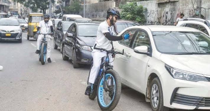 Traffic Police Officer Switched to Bicycle Amid Rising Fuel Costs
